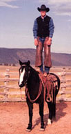 Blue Allen standing on horse in old photo